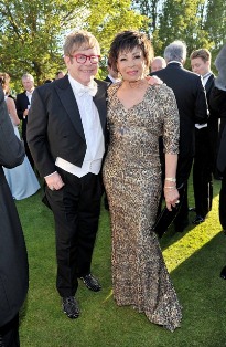 Elton John and Dame Shirley Bassey wearing Chopards