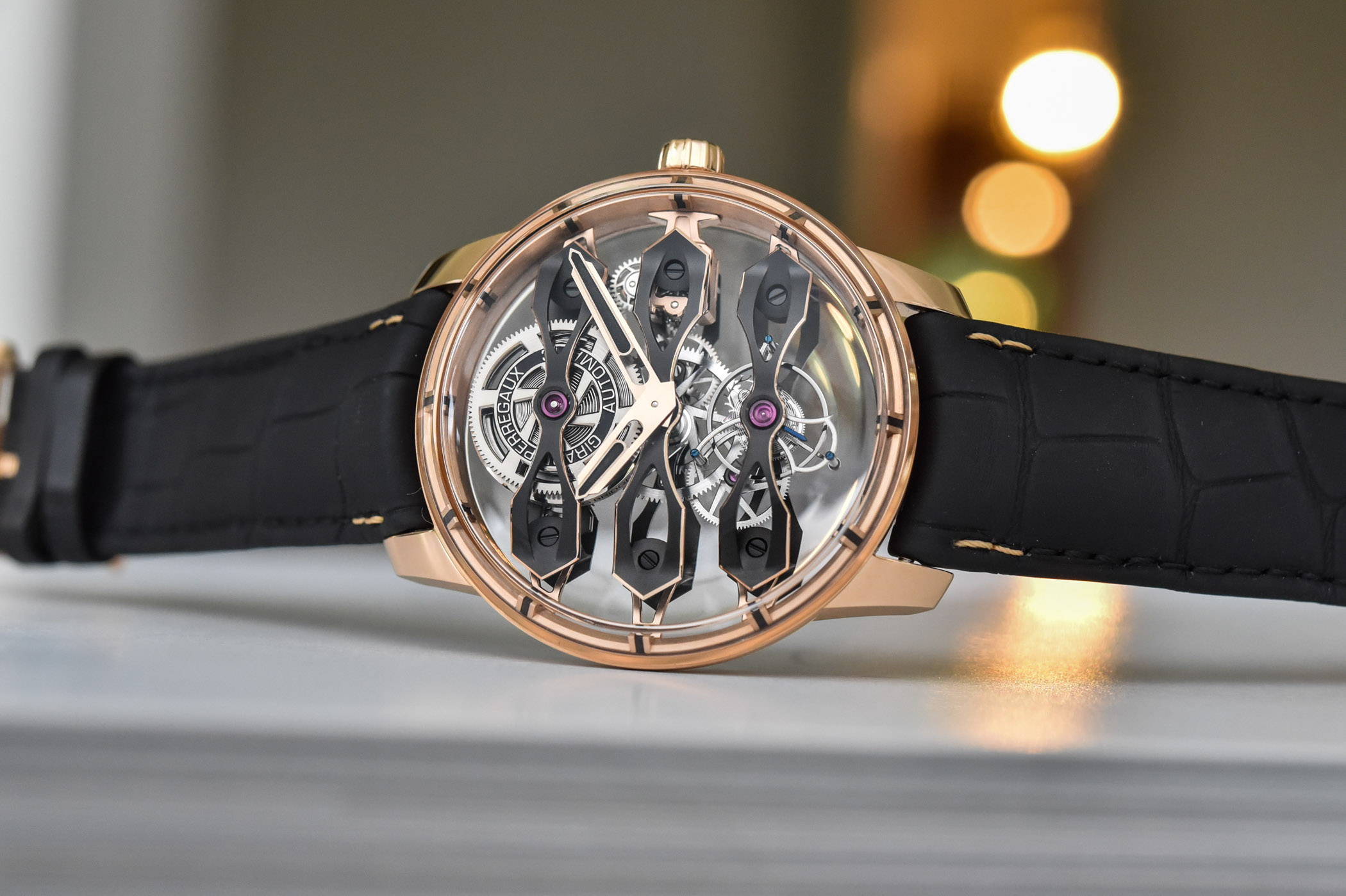 Girard Perregaux Tourbillon with Three Flying Bridges in Rose Gold hands on 8