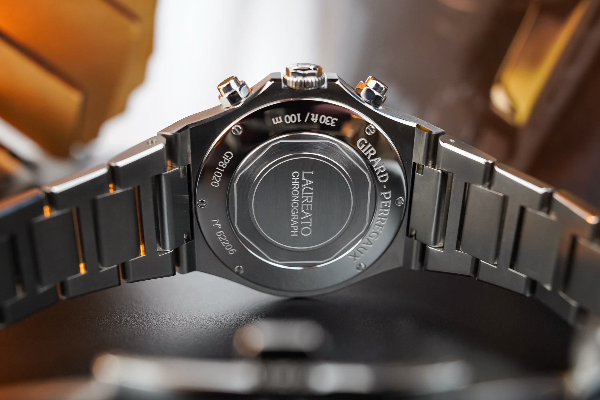 Girard Perregaux Laureato Chronograph Ti49 Titanium luxury sports watch integrated bracelet video review 12